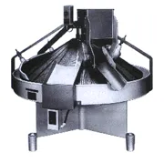 An industrial dough-rounder machine.